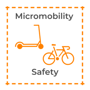 An orange icon of a scooter and a bicycle with the words, "Micromobility Safety."